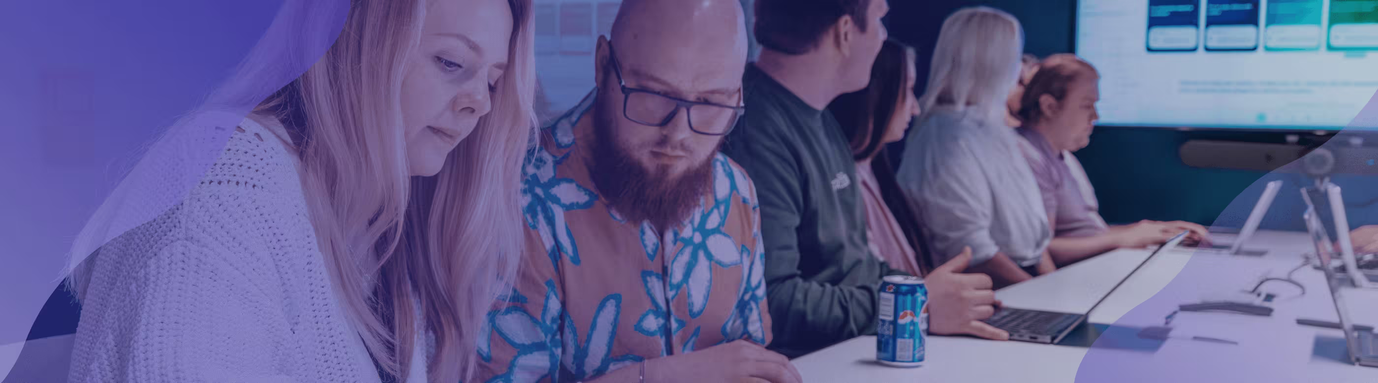 A team of people in a meeting